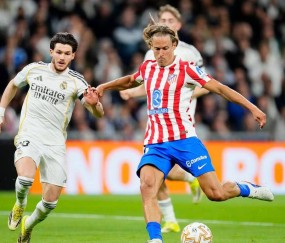 维尼修斯梅开二度助皇马10人逆转马竞 5连胜紧追西甲榜首